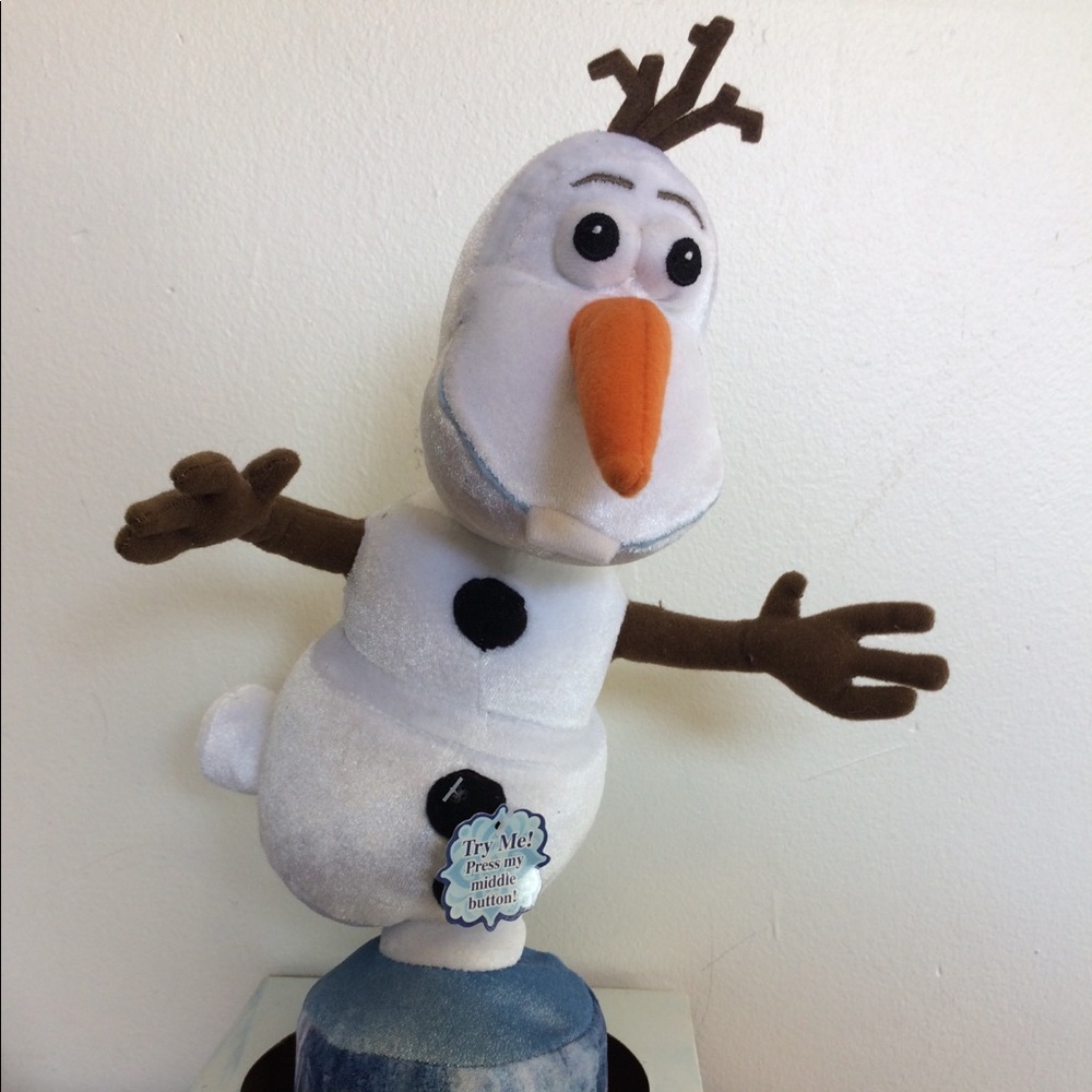 Spinning Olaf interactive talking plush toy